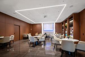 Photo de la galerie de l'établissement Guangzhou Hutian Hotel, à Canton