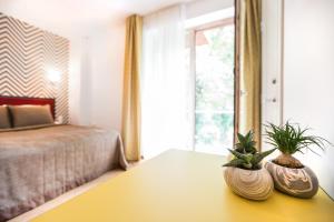 Postel nebo postele na pokoji v ubytování Viešbutis Simpatija