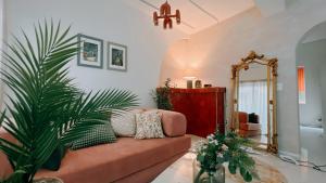 a living room with a couch and a mirror at Jeonpo Cafe Street Near Seomyeon Entire House 2 Floors 7 Guests in Busan
