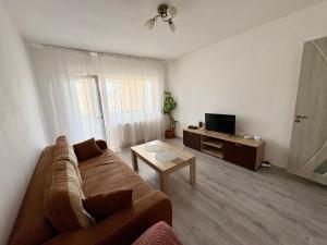 Μια τηλεόραση ή/και κέντρο ψυχαγωγίας στο Apartament Târgoviște în regim hotelier cu 2 camere