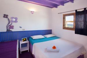Ένα ή περισσότερα κρεβάτια σε δωμάτιο στο Eldorado Lodge and Restaurant