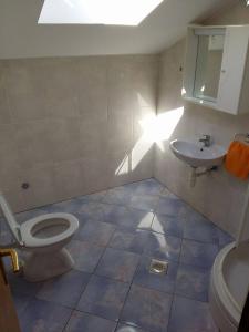 Kúpeľňa v ubytovaní Apartments Dada