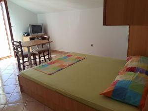 Posteľ alebo postele v izbe v ubytovaní Apartments Dada
