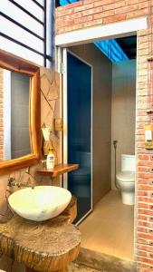 a bathroom with a sink and a toilet at Đà Lạt in Phú Quốc Homestay - Free Airport Pickup for 4 night bookings in Phu Quoc