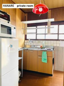 Η κουζίνα ή μικρή κουζίνα στο TAKIO guesthouse HANARE