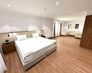 Ένα ή περισσότερα κρεβάτια σε δωμάτιο στο Boutique Hotel Misgaron +48 φωτογραφίες