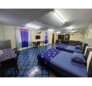 Кровать или кровати в номере Capital O 91206 Homestay Pelangi Ban Pecah