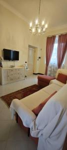 TV a/nebo společenská místnost v ubytování Casa Margherita