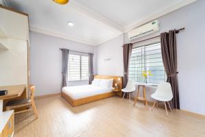Postel nebo postele na pokoji v ubytování LOT Hotel