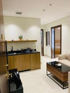 Kuchyň nebo kuchyňský kout v ubytování ليناتيل للشقق المخدومه