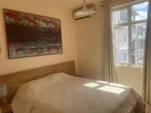 Ένα ή περισσότερα κρεβάτια σε δωμάτιο στο Villa Maloya Penthouse