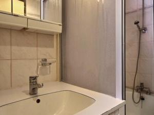 a bathroom with a sink and a shower at Appartement 4 pièces, 3 salles de bains, ski aux pieds à Plagne Villages - FR-1-455-79 in La Plagne