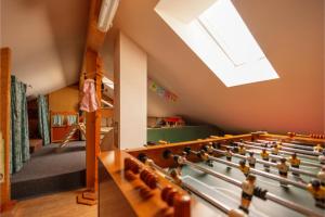 a room with a bunch of toy figures on the ceiling at Ferienhof Sinz im Allgäu in Weiler-Simmerberg