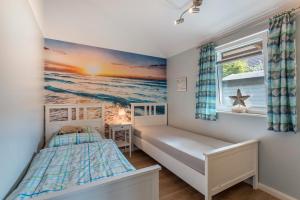 Ένα ή περισσότερα κρεβάτια σε δωμάτιο στο Nordlicht