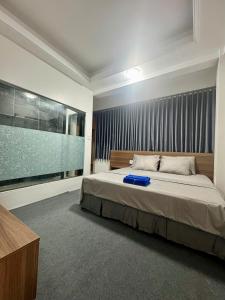 Postel nebo postele na pokoji v ubytování Hotel & Massage HƯƠNG GIANG 3