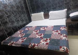 Katil atau katil-katil dalam bilik di Durga Home stay