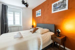 Ένα ή περισσότερα κρεβάτια σε δωμάτιο στο Automobile