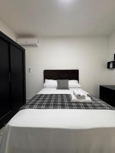 Postel nebo postele na pokoji v ubytování Apartamento nº03 No CENTRO de FOZ