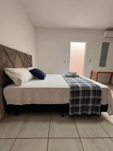 Postel nebo postele na pokoji v ubytování Apartamento nº03 No CENTRO de FOZ + 12 fotografií