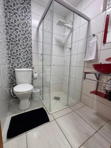 Koupelna v ubytování Apartamento nº03 No CENTRO de FOZ