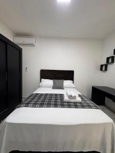 Postel nebo postele na pokoji v ubytování Apartamento nº03 No CENTRO de FOZ