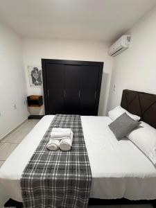 Postel nebo postele na pokoji v ubytování Apartamento nº03 No CENTRO de FOZ