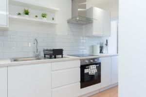 Η κουζίνα ή μικρή κουζίνα στο Open Mind Property - Cozy 4BR Flat & HotTub, Bognor