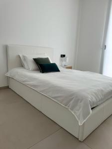 Ένα ή περισσότερα κρεβάτια σε δωμάτιο στο Gc Luxury Apartments e Spa