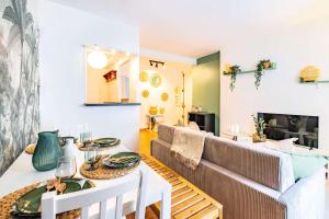 a living room with a couch and a table at 4 Guests Flat - Place Monge in Paris