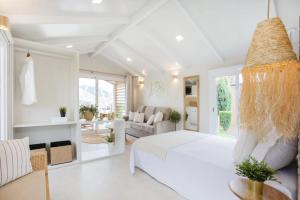 Ένα ή περισσότερα κρεβάτια σε δωμάτιο στο Bungalows Mar Menor, paz a orillas del mar