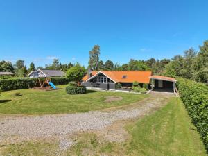 an aerial view of a house with an orange roof at Holiday Home Gretta - 400m from the sea by Interhome in Dannemare