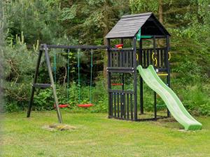 Ο χώρος παιχνιδιού για παιδιά στο Holiday Home Wiger - 150m from the sea by Interhome