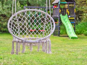 Ο χώρος παιχνιδιού για παιδιά στο Holiday Home Wiger - 150m from the sea by Interhome