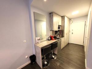 Kuchyň nebo kuchyňský kout v ubytování Nephele by Casa D'Oro + 6 fotografií
