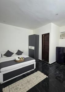 Ένα ή περισσότερα κρεβάτια σε δωμάτιο στο Cozy Studio in Gurgaon - Premium Location