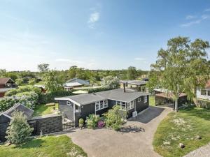 an aerial view of a house with a yard at Holiday Home Tyyni - 75m from the sea by Interhome in Broager
