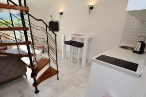 Η κουζίνα ή μικρή κουζίνα στο Apartments House 91