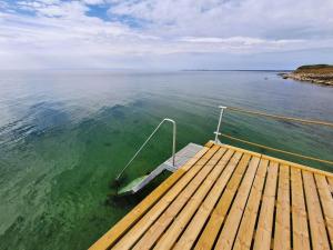 a boat in a large body of water at Holiday Home Faina - 100m from the sea by Interhome in Humble