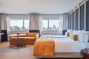 Uma área de estar em Hotel Acta Moa