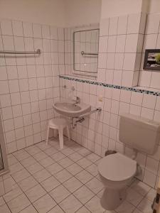 Ένα μπάνιο στο Ferienwohnung An der Wurmbergseilbahn