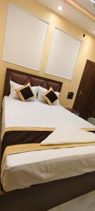 Katil atau katil-katil dalam bilik di Hotel Bodhi Heritage And Restaurant