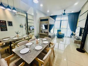 a dining room with a table and chairs at Group-Friendly Stay in Putrajaya & IOI City Mall in Putrajaya