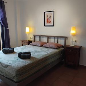 Postel nebo postele na pokoji v ubytování Residencial Almadraba E2