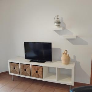 TV a/nebo společenská místnost v ubytování Residencial Almadraba E2