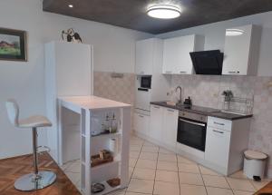 Η κουζίνα ή μικρή κουζίνα στο Rooms4U +11 φωτογραφίες