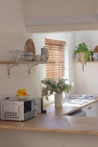 Køkken eller tekøkken på Three Streams Cottages