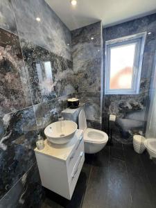 Koupelna v ubytování House