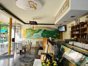 Fotografie z fotogalerie ubytování Loving Hut Pension & Restaurant v destinaci Sankt Kanzian