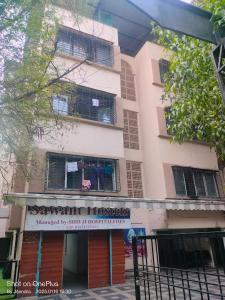 a building with a sign in front of it at Atlantas Stays in Nashik +11 photos
