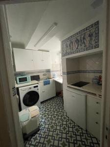 Kuchyň nebo kuchyňský kout v ubytování Downtown Alfama Fado